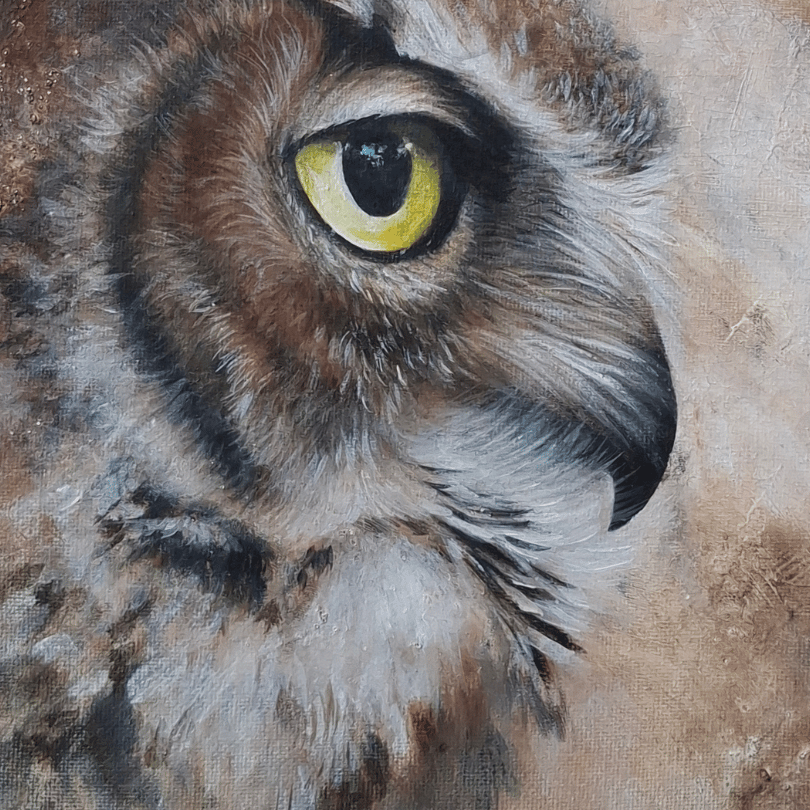 Close-up painting of an owl's face with detailed brown, gray, black, and white feathers and a bright yellow eye on a textured beige background.