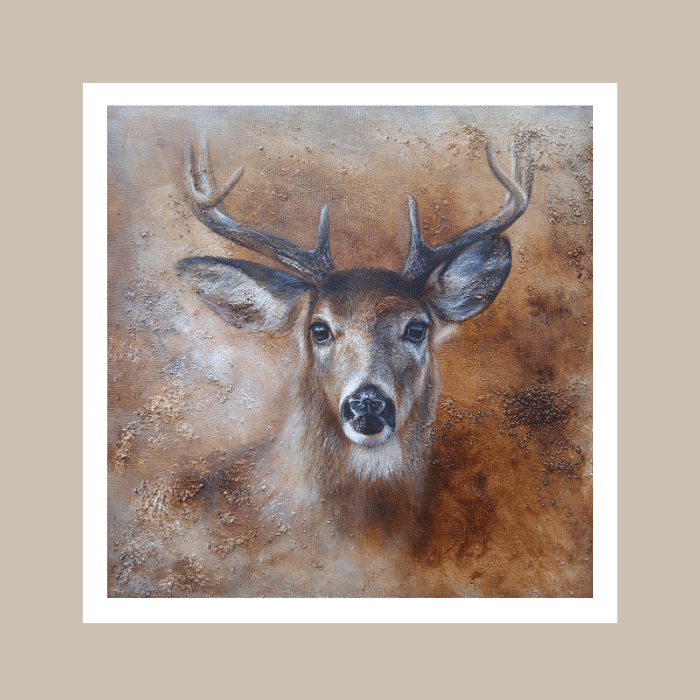 A square art print featuring a painted deer head with antlers, centered on a white border against a beige background.