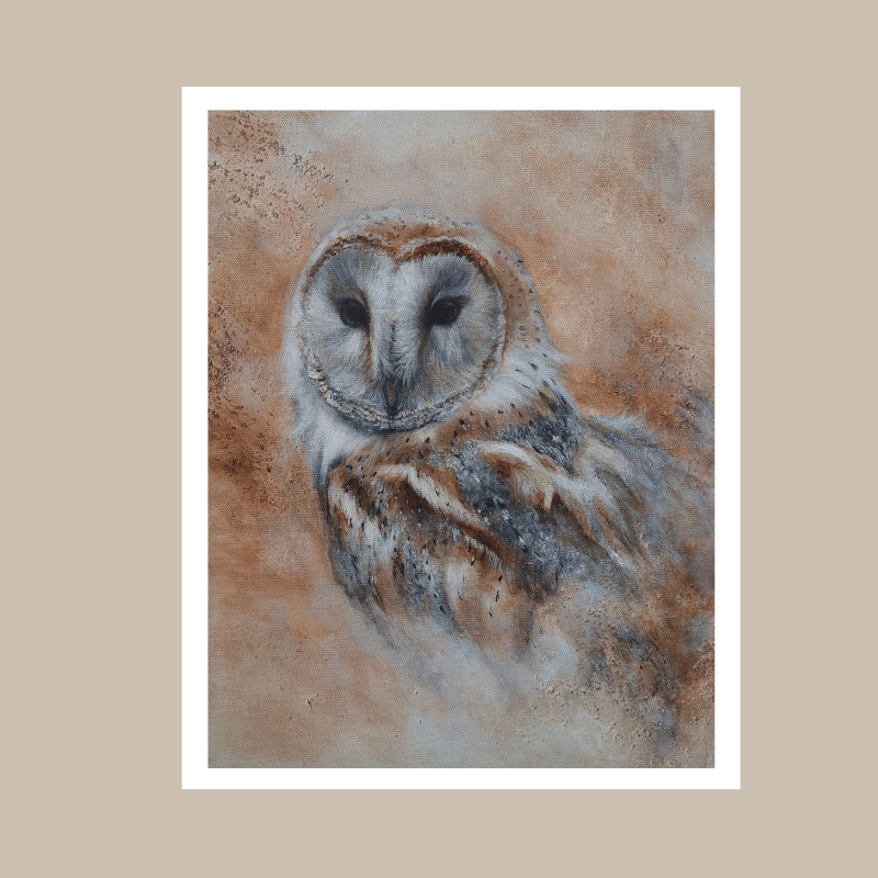 A square art print featuring a painted barn owl with a heart-shaped face, shown centered on a beige background with a white border around the print.